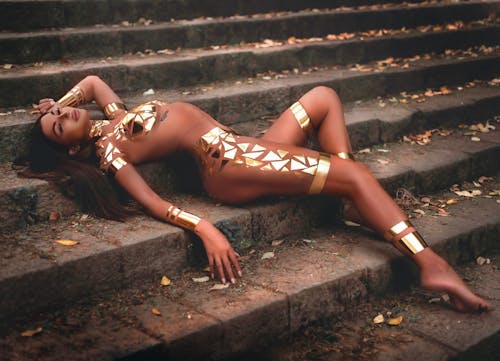 Sexy Woman Lying on Concrete Stairs 