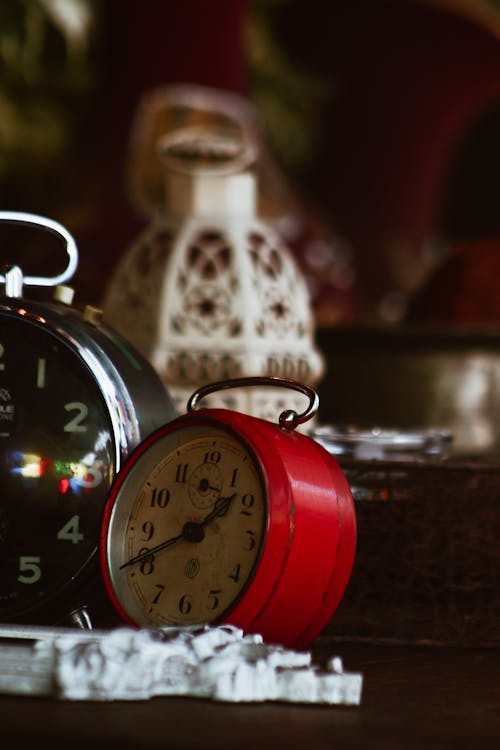 A Red and Silver Alarm Clock