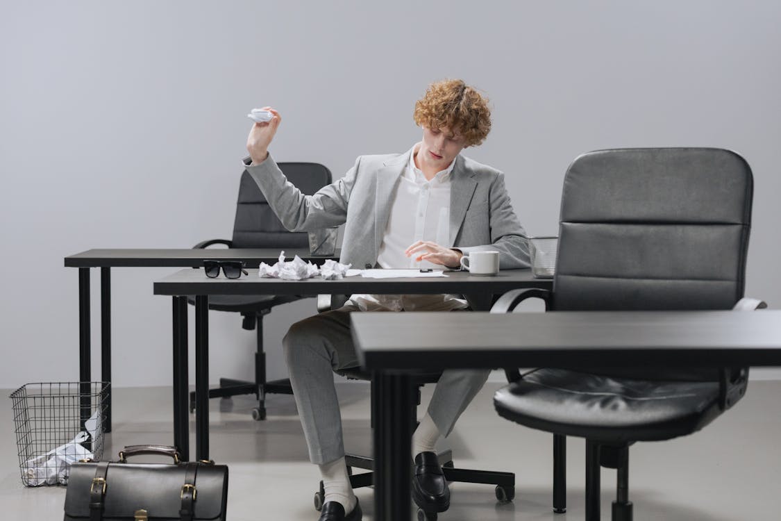 A Man Sitting at the Table · Free Stock Photo