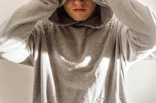 Man Wearing Gray Hoodie