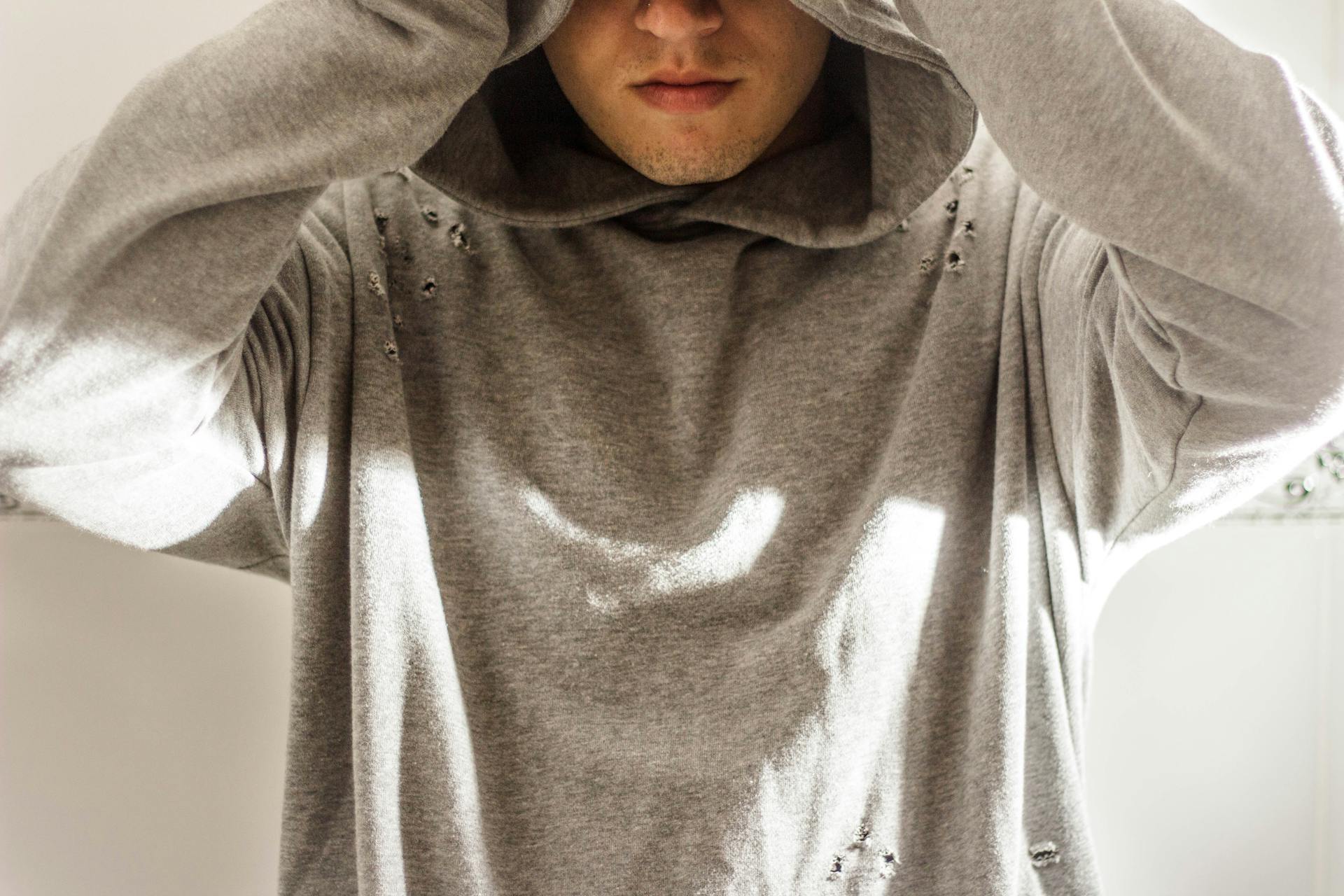 Man Wearing Gray Hoodie