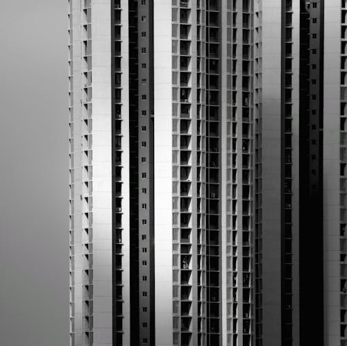 A Grayscale Photo of a High Rise Building