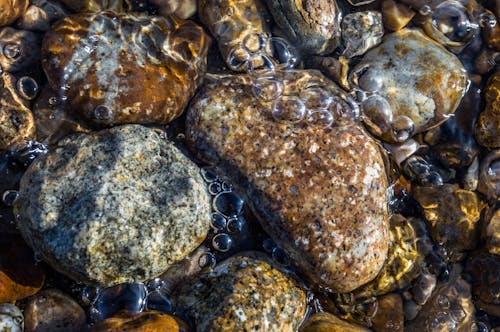 Closeup Photo Brown Brown Stone With Bubbles