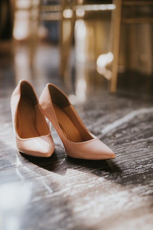 Free Close-Up Shot of Heels on the Floor Stock Photo