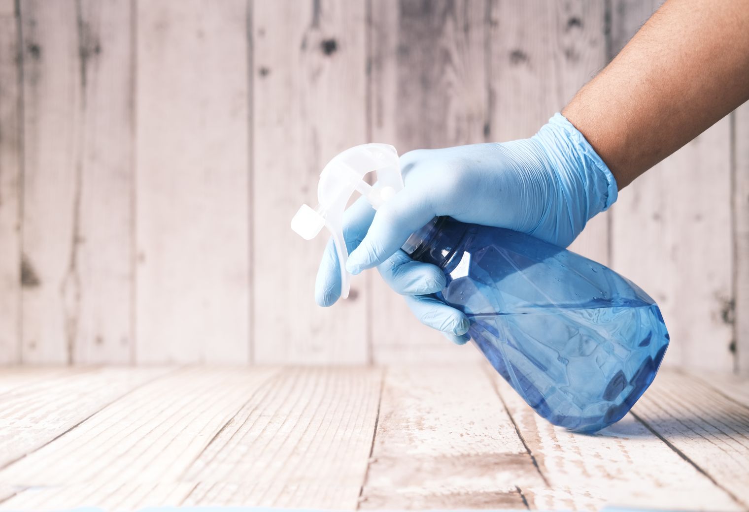 Kitchen Spraying in Stamford Hill — a decorator at work mid-project