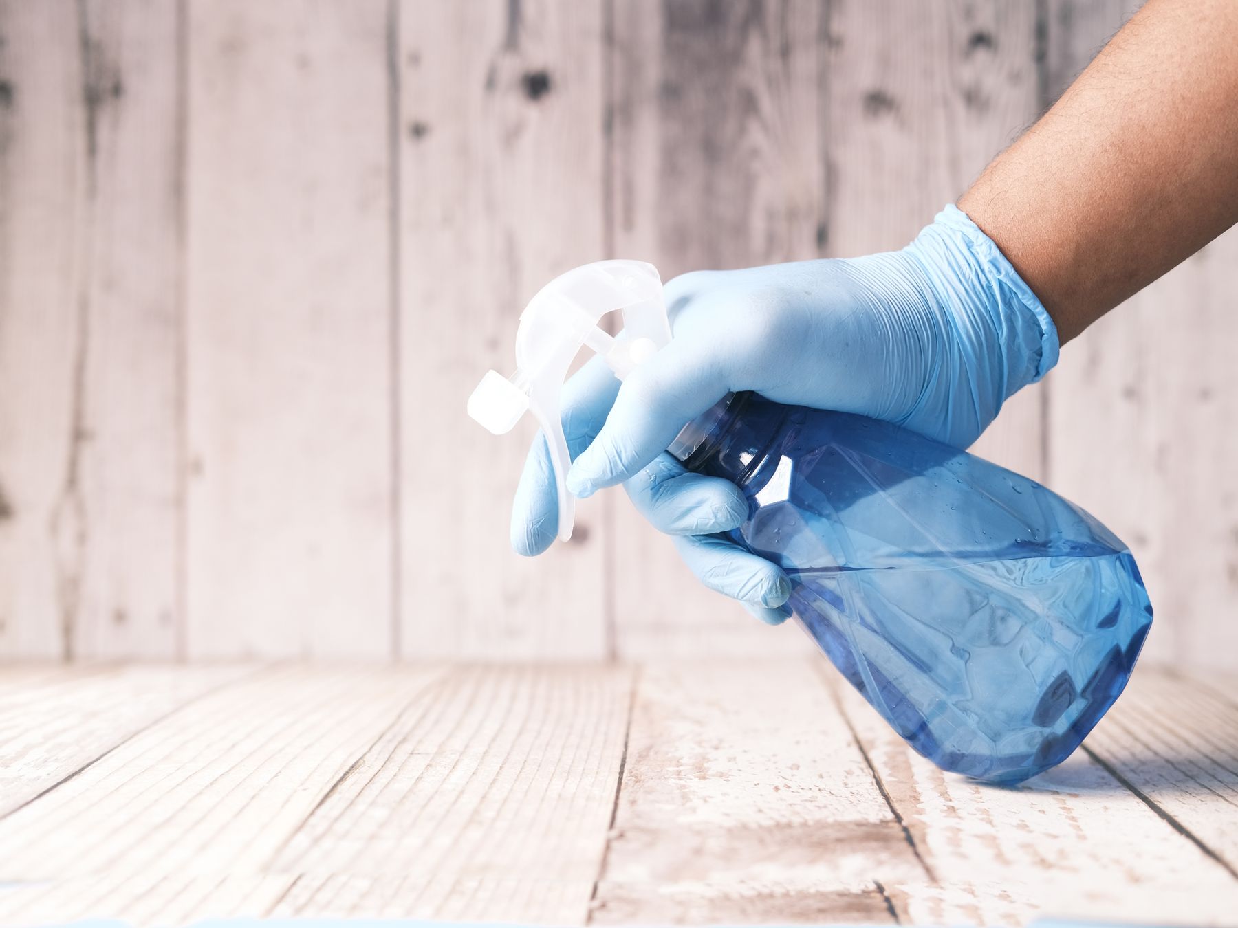 Kitchen Spraying in Kensington — a decorator at work mid-project