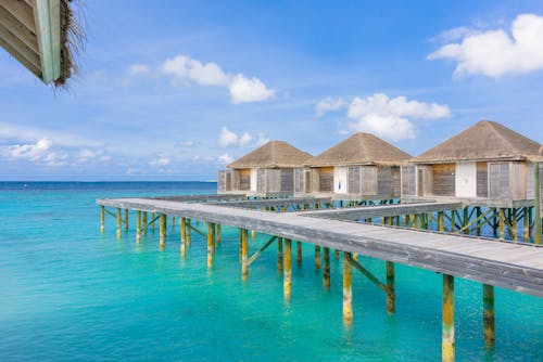 Foto d'estoc gratuïta de a l'aire lliure, cabanes a la platja, maldives