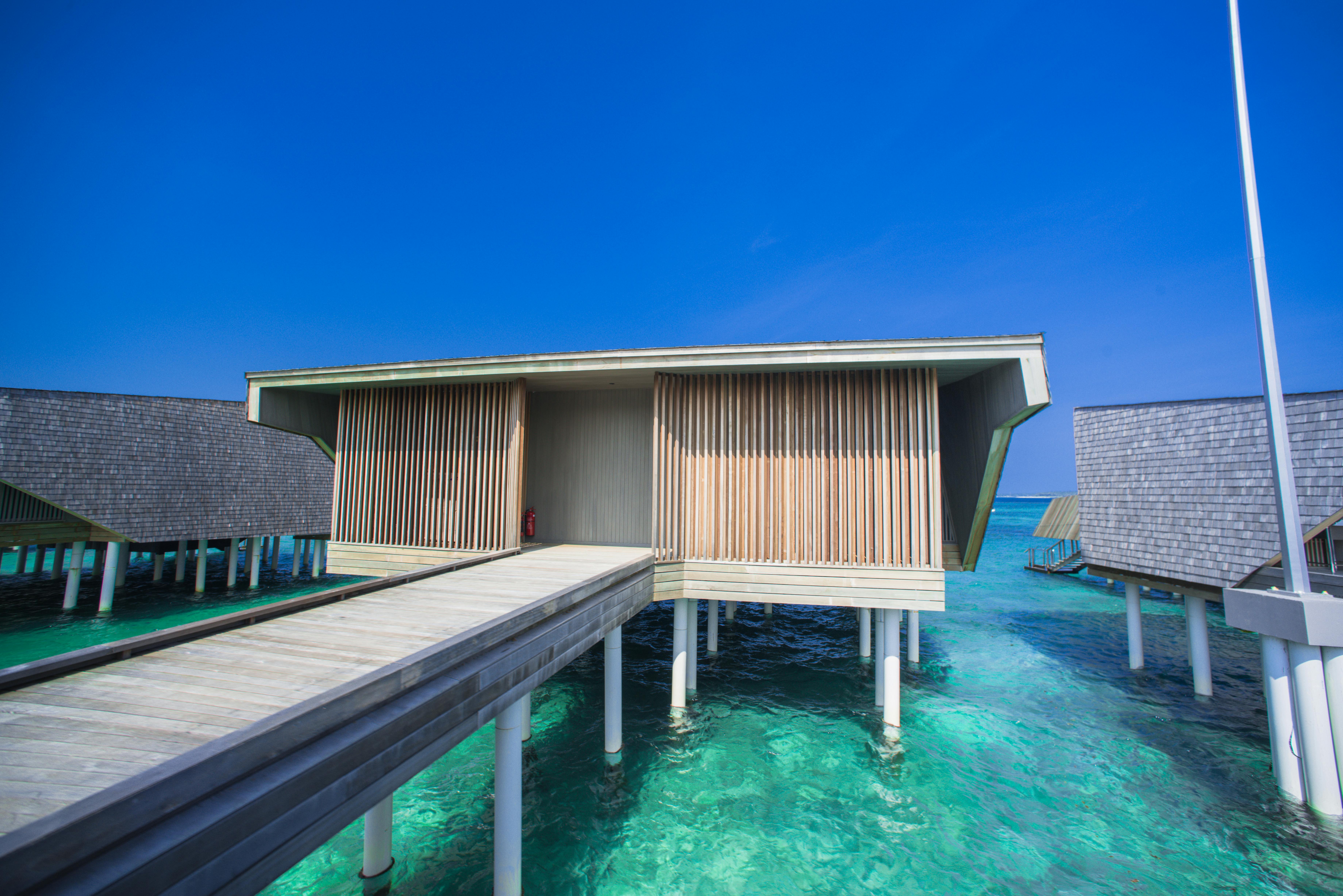 overwater bungalow in the Maldives - best tropical vacation spots
