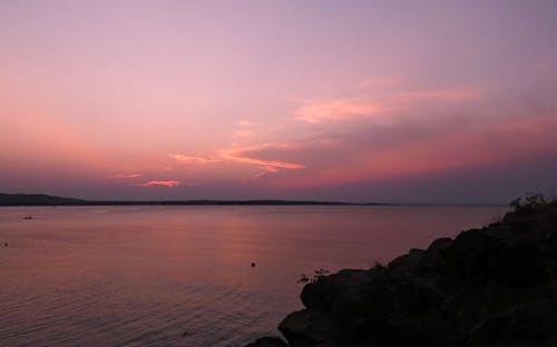 Foto profissional grátis de água, alvorecer, cair da noite