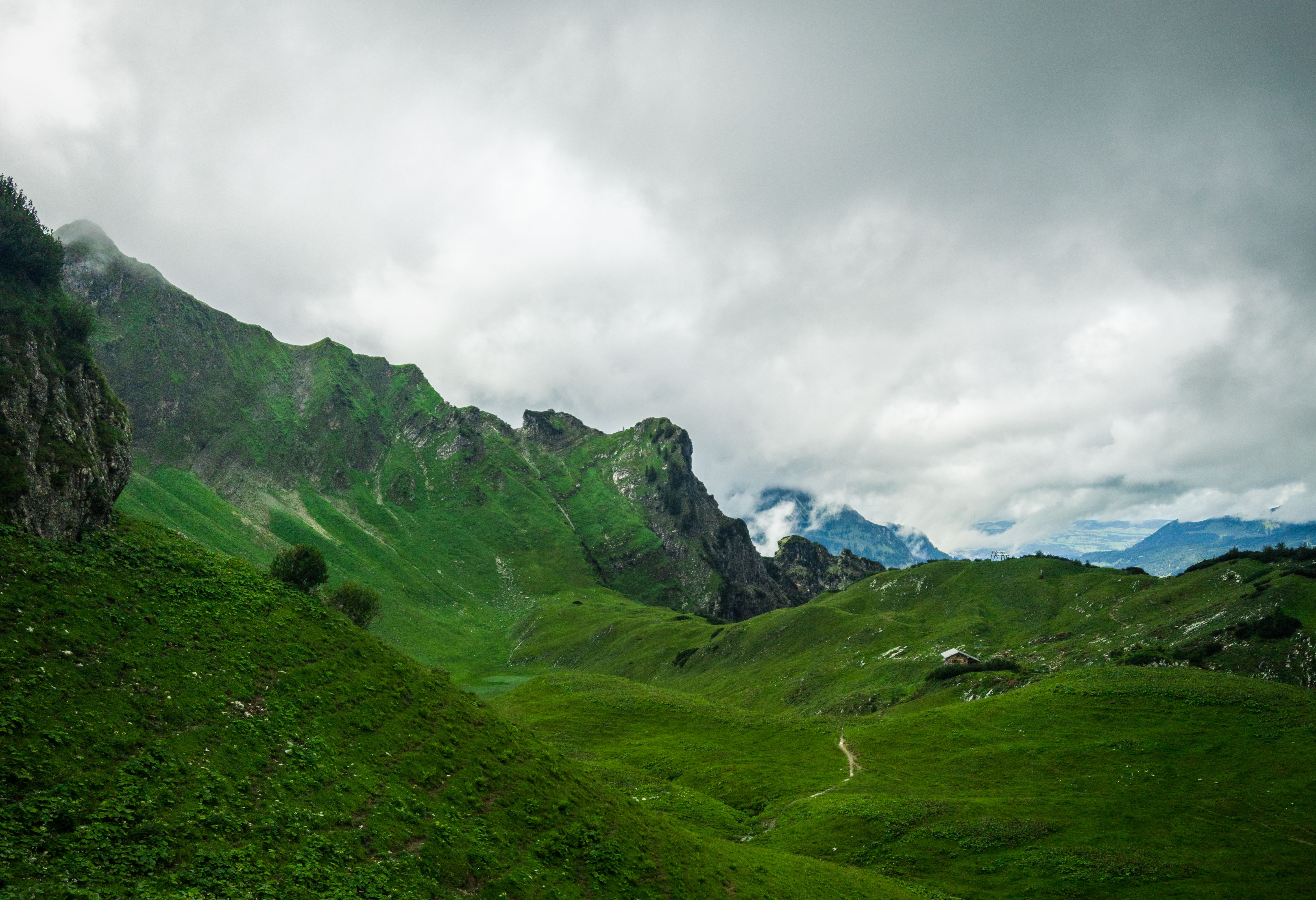 A Green Mountains Under White Clouds · Free Stock Photo