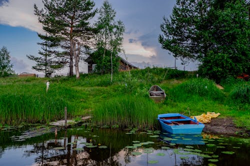 Gratis stockfoto met boot, dorp, meer