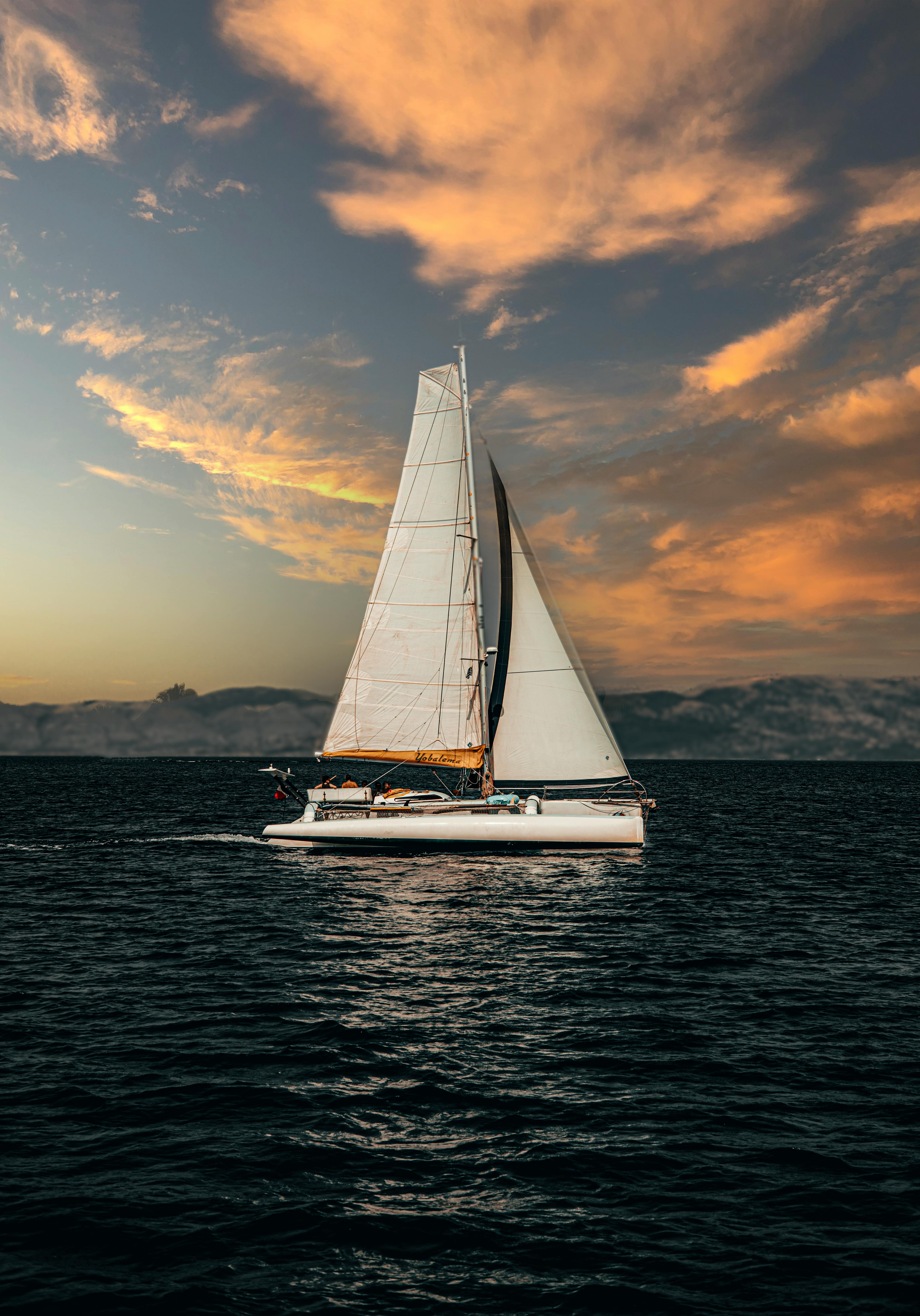 Sailing Boat on Body of Water · Free Stock Photo