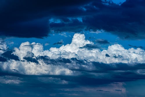 A Fluffy White Clouds on the Sky