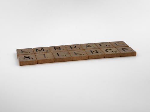 Brown Wooden Blocks on White Surface