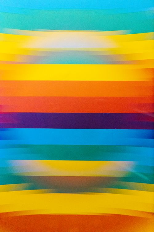 Free A vibrant abstract design with blurred colorful horizontal stripes, creating a dazzling visual pattern. Stock Photo