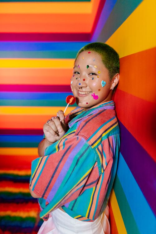 People Using Stickers A Woman with Stickers on Her Face · Free Stock Photo