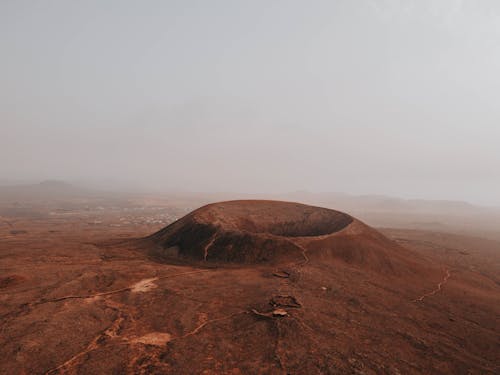 Brown Mountain Under Gloomy Sky