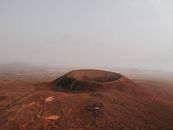 Brown Mountain Under White Sky