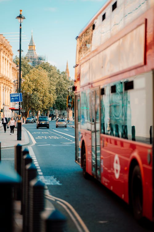 A Red Double Decker Bus on the Road