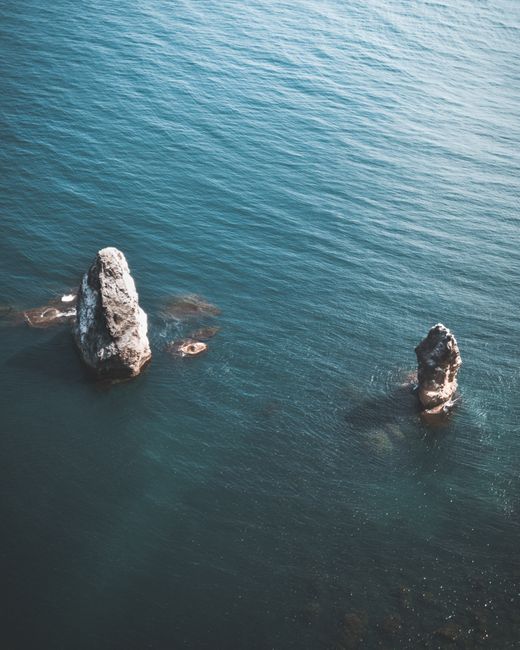 Aerial photo of rock formations in the tranquil sea near Sevastopol. Perfect for nature and travel themes.