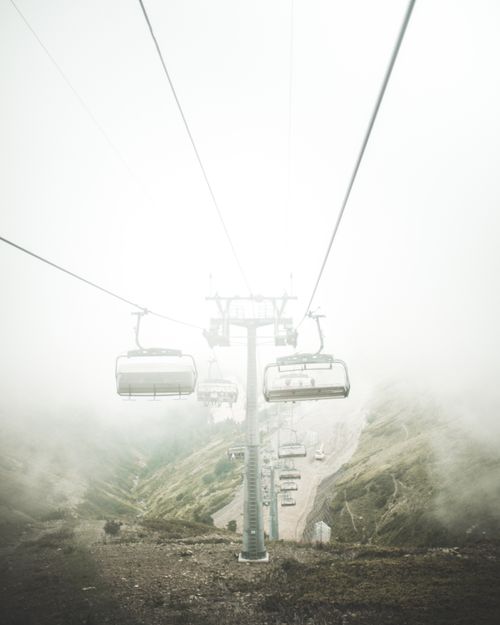 Free Misty view of cable cars traversing through fog in Krasnodar region, Russia. Stock Photo