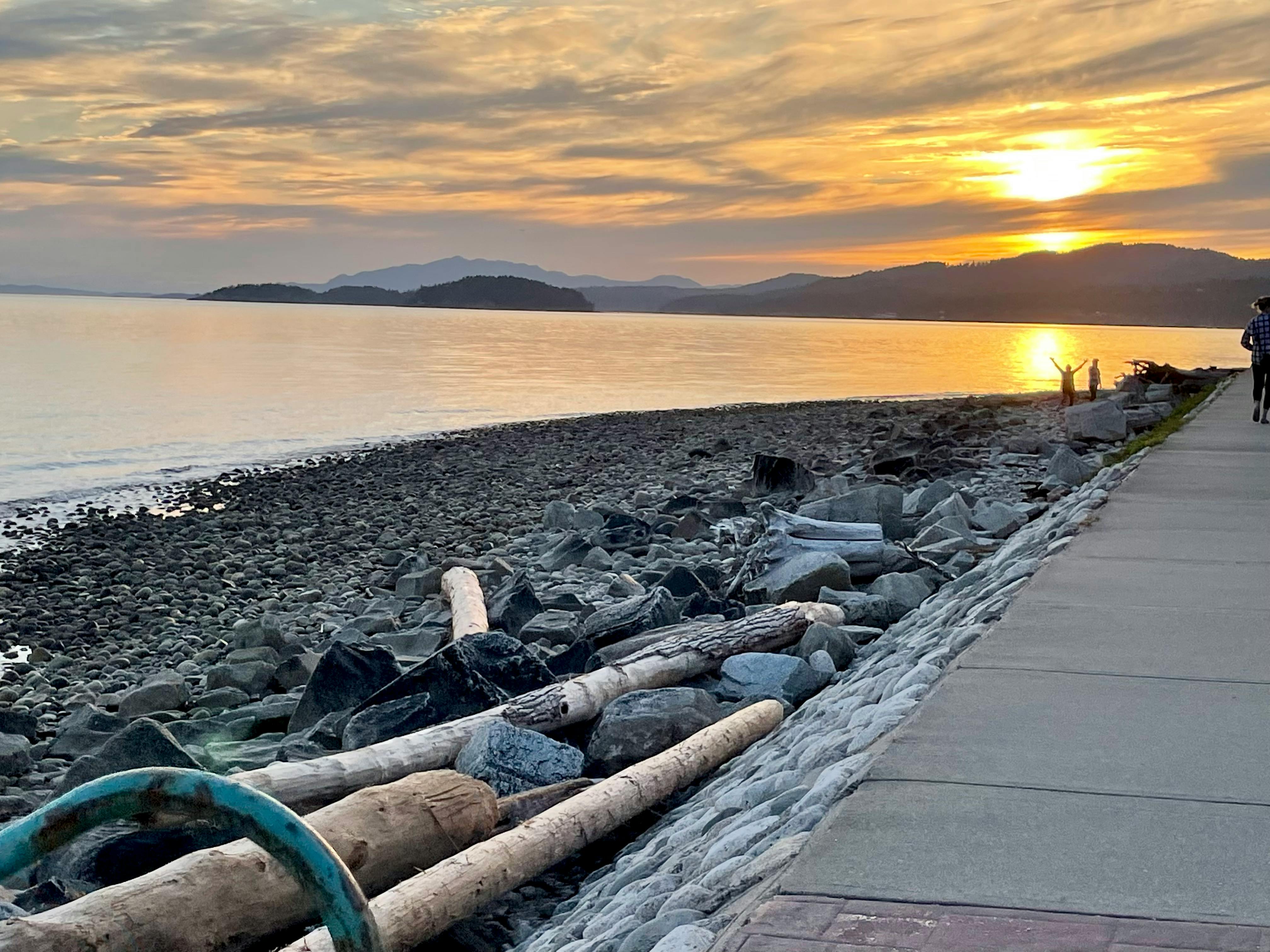 A close-up of a spoonful of the Tex-Mex brunch skillet, showing the runny egg yolk and hearty beans.