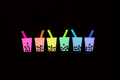 Colorful Cups on Black Background