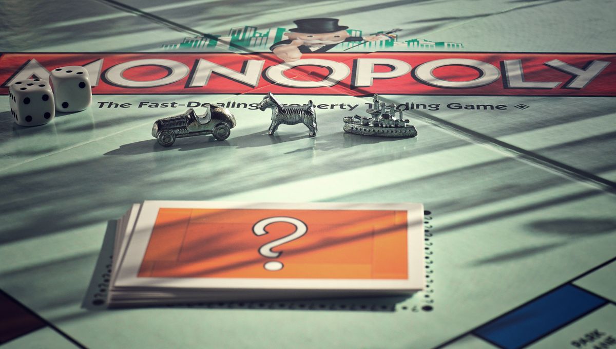 Detailed close-up of a vintage board game showing cards and tokens