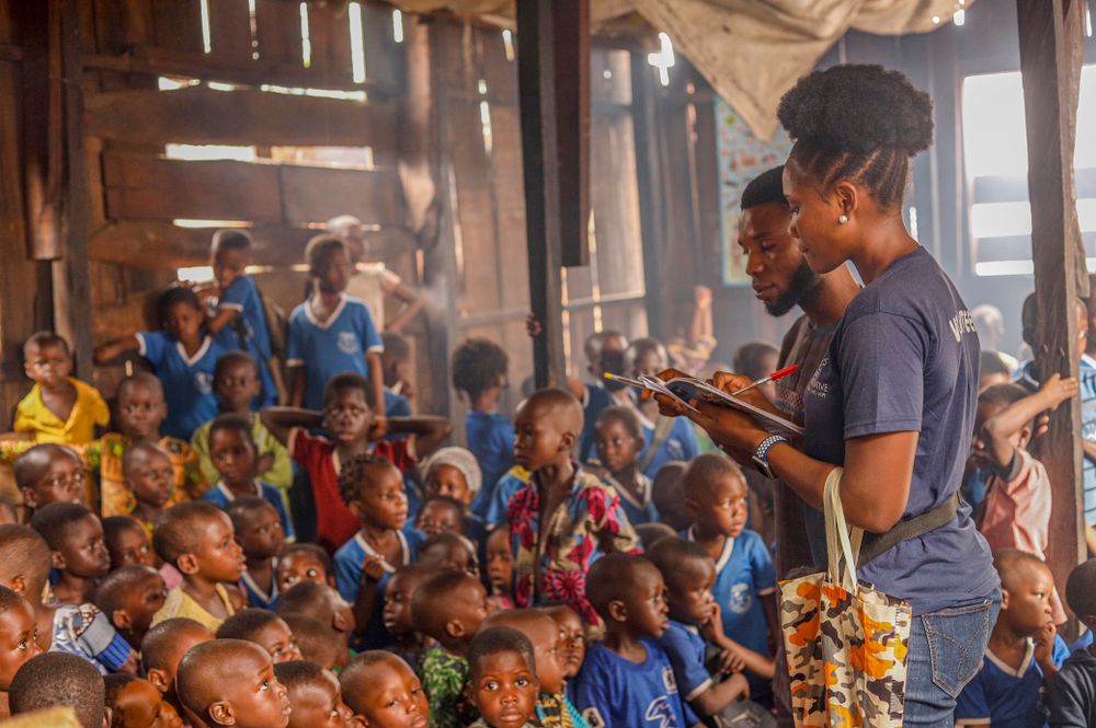 African children participating in an educational community session