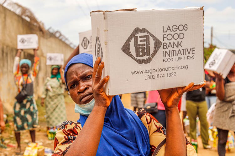 People Carrying Boxes