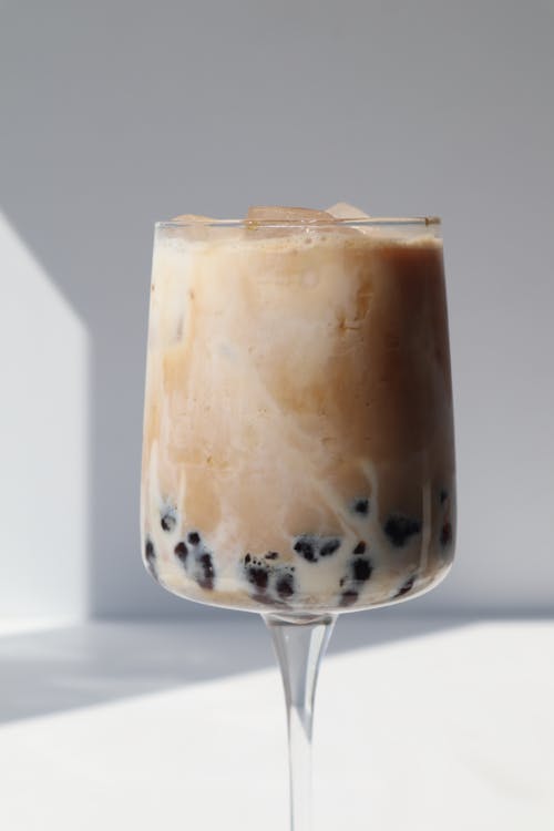 Close-Up Shot of Iced Coffee in Clear Glass