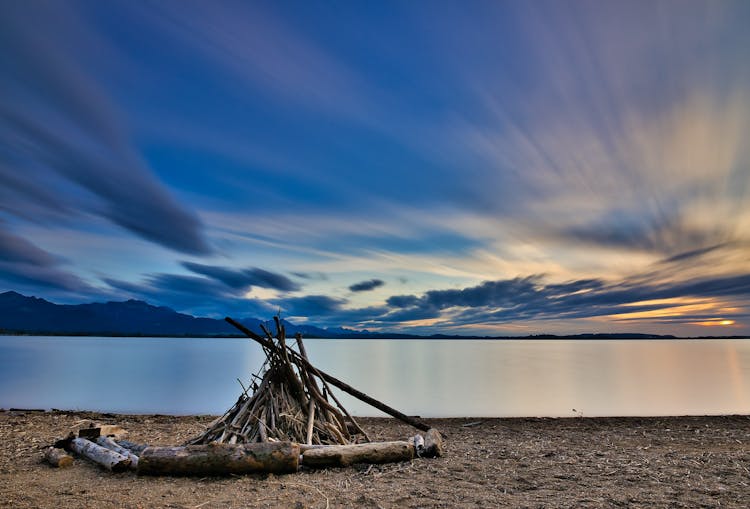 A Bonfire On A Lake Shore