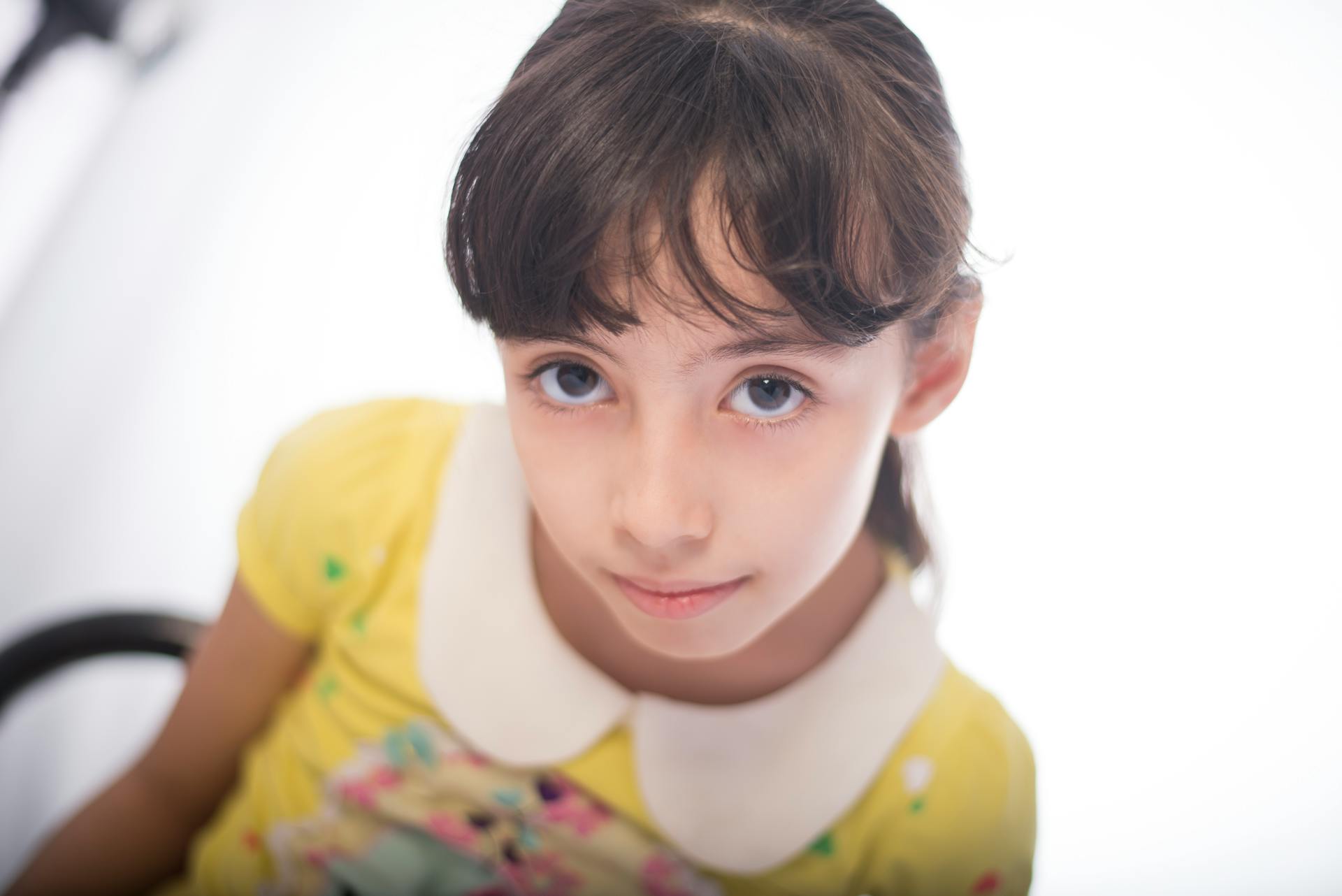 Girl in Yellow and White Collared Short-sleeved Top