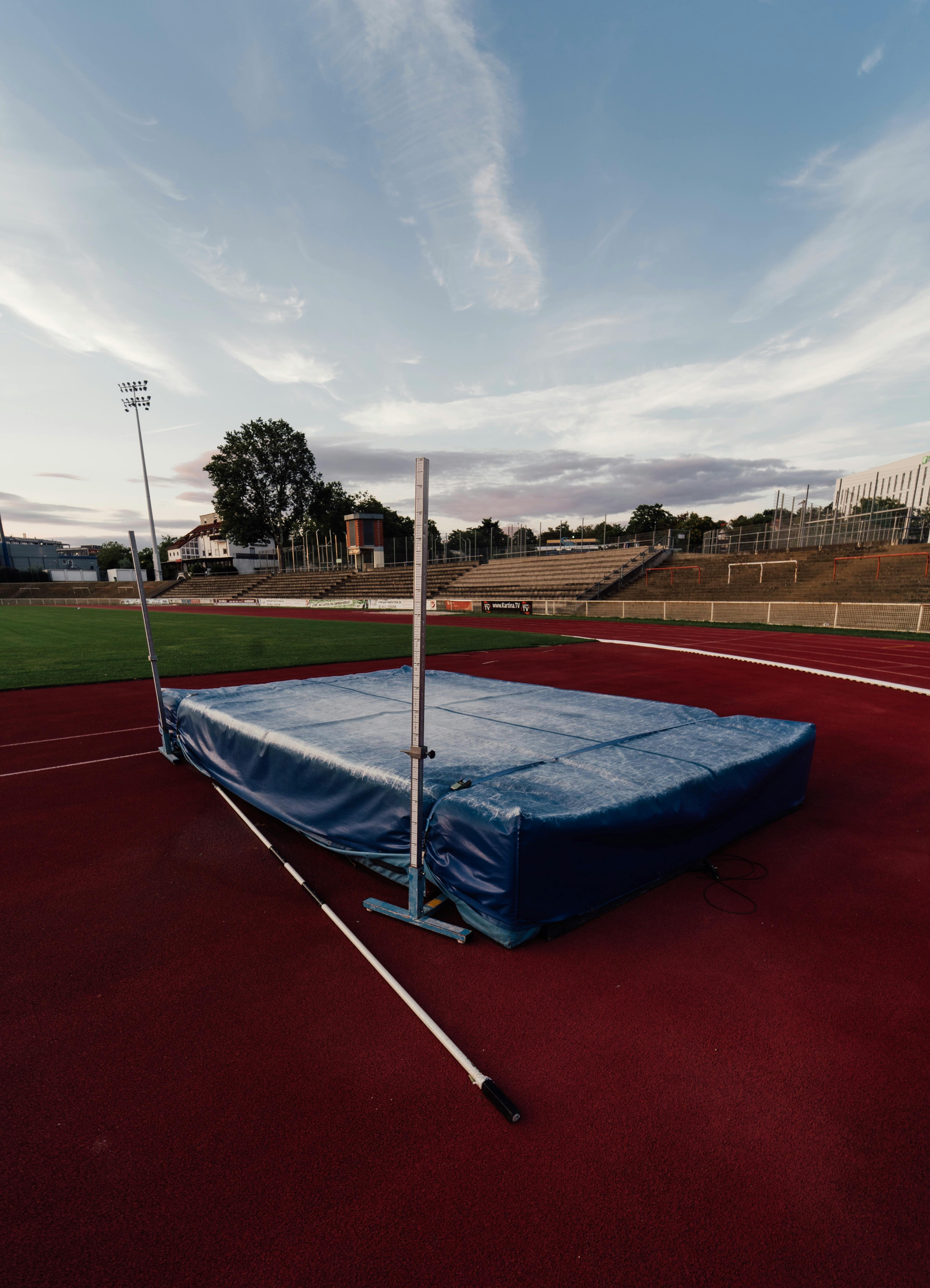 A High Jump Mattress on a Track · Free Stock Photo