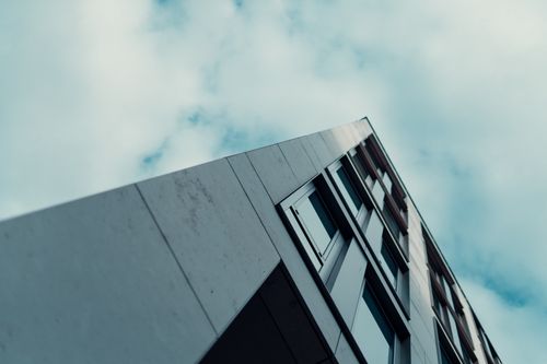 Free Low angle view of a modern building against a cloudy sky in Wiesbaden, Germany, showcasing urban architecture. Stock Photo