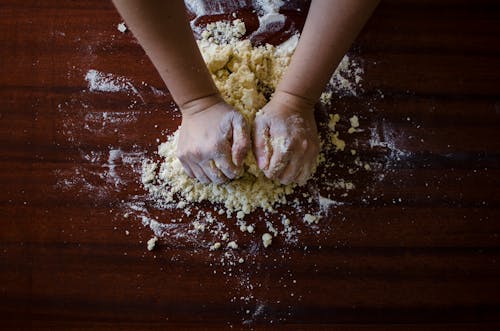 Free Person Mixing Dough Stock Photo