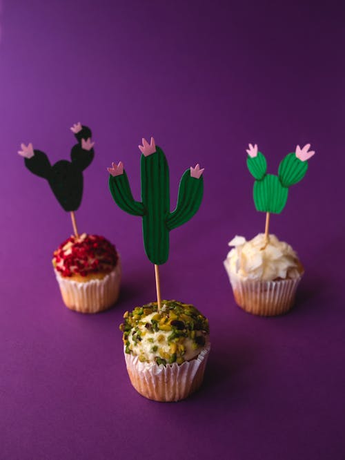 Cupcakes With Pink and Green Flower on Top