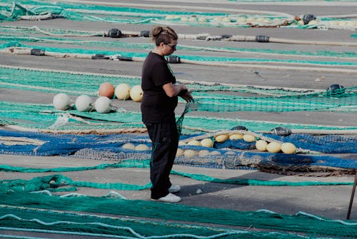 A Person Looking Fishing Net