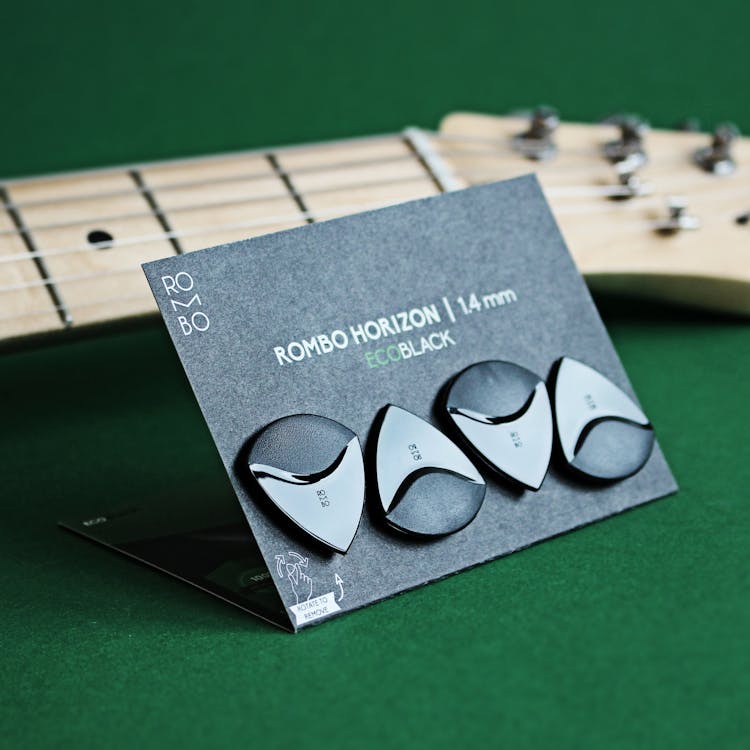 

Black Guitar Picks On A Card