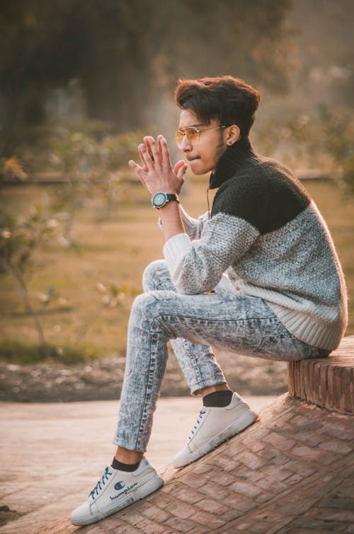 A Man in Gray and Black Sweater