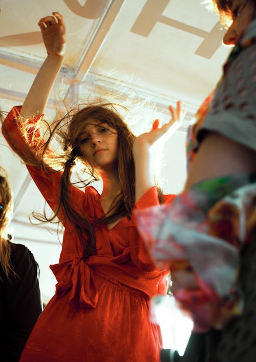 Woman in Red Dres Dancing