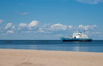 White and White Ship on Sea Under Blue Sky and White Clouds