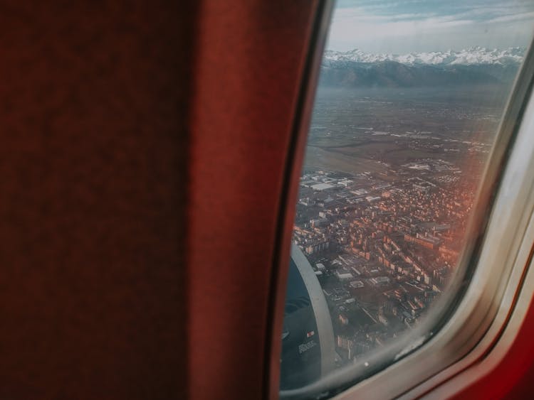 Airplane Window In Close Up Shot