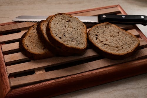 Foto profissional grátis de alimento, faca, fatias