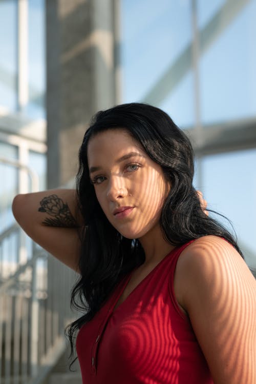 Portrait of a Beautiful Woman in Red Top