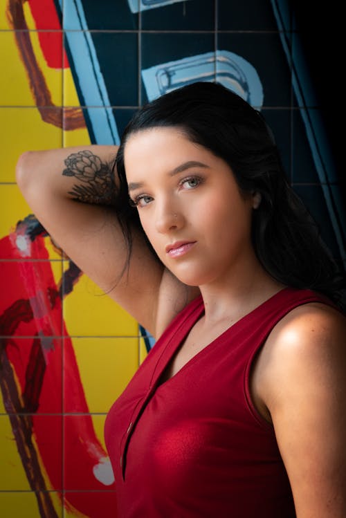 Portrait of a Beautiful Woman in Red Top