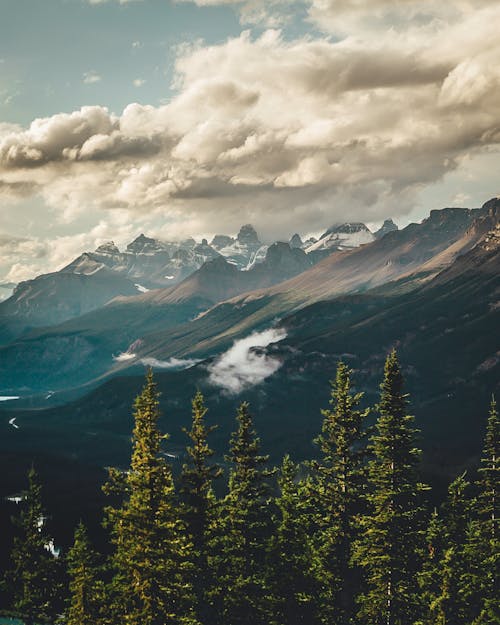 Gray Mountains Under Gray Sky at Daytime