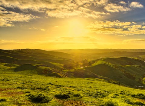 Beautiful sunrise over rolling hills in Yankalilla, South Australia, capturing nature's tranquility.