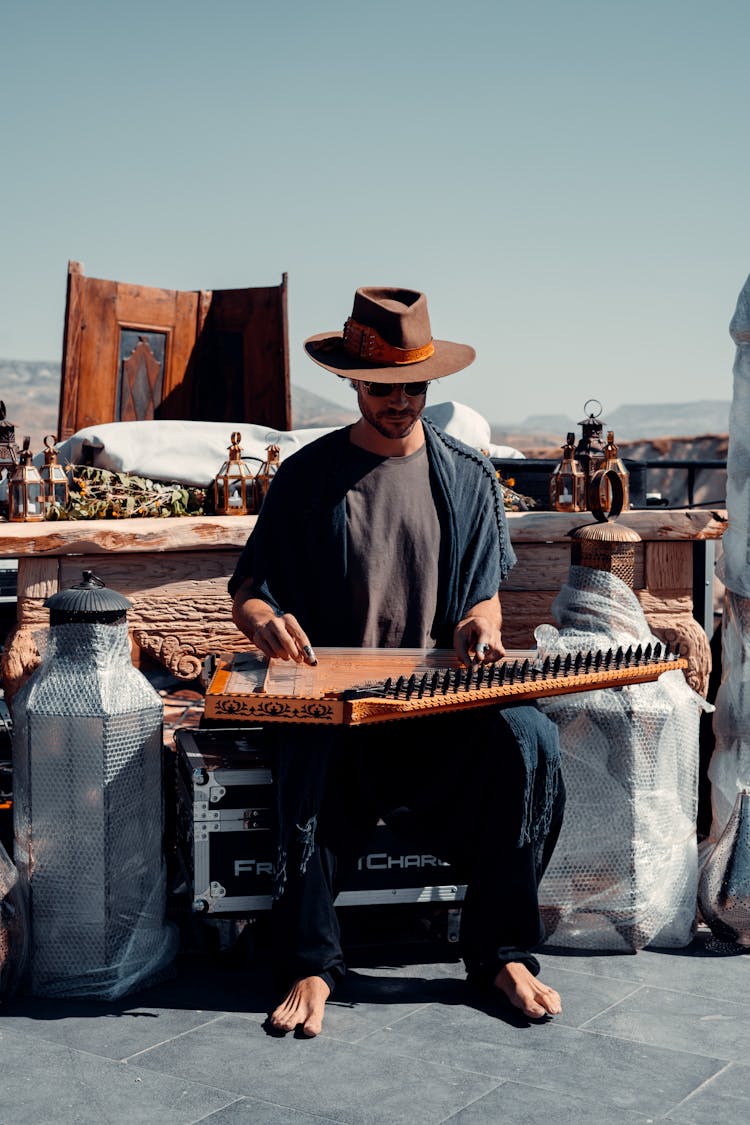 A Man Playing Kanun