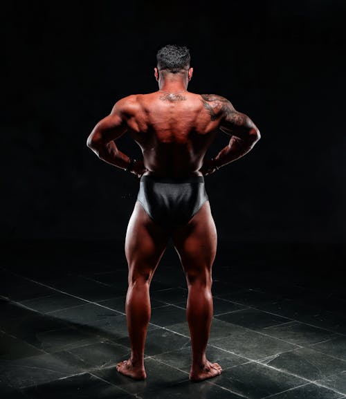 A Bodybuilder Showing His Back